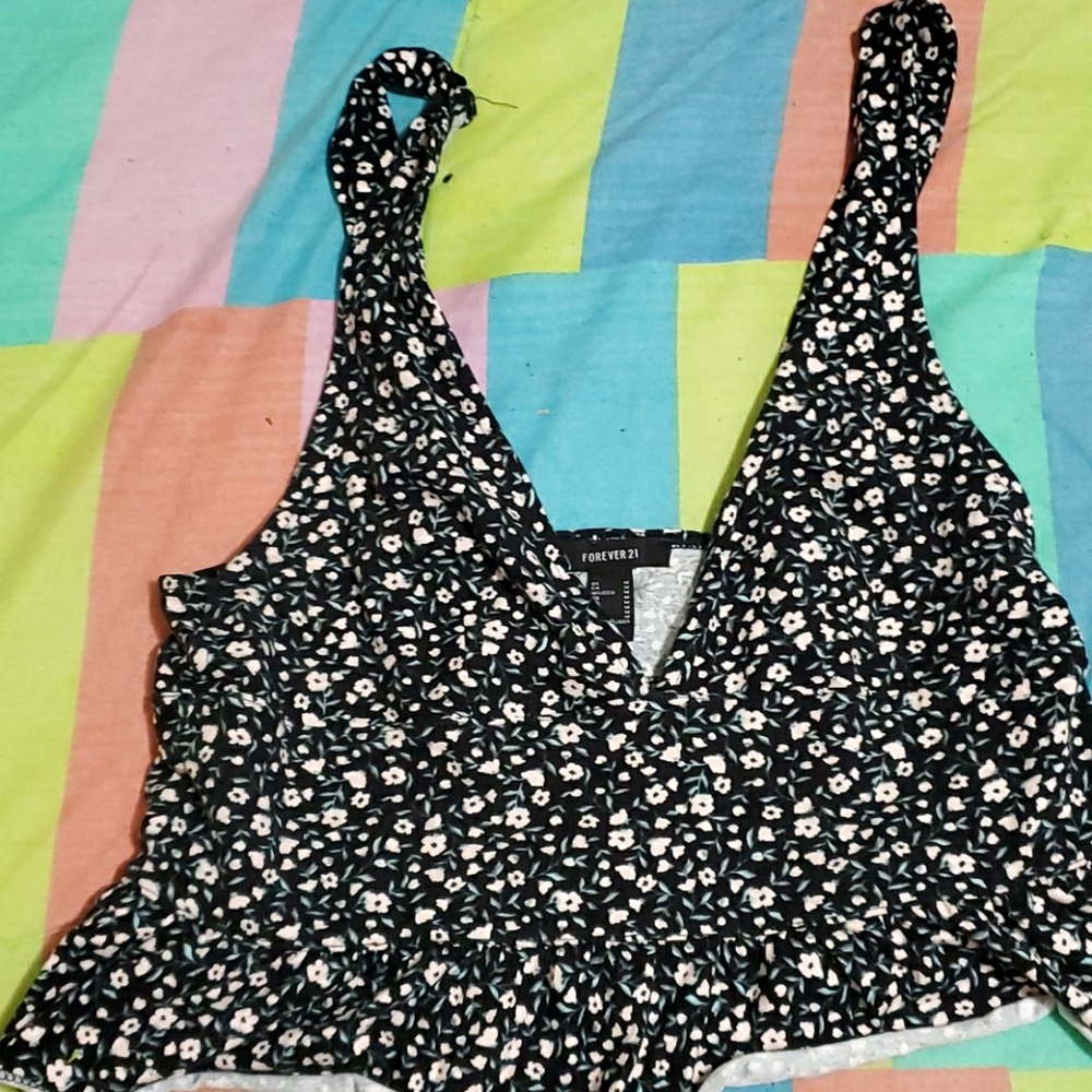 It is a black floral deep v crop top forever21